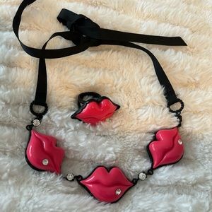 Betsey Johnson Fuchsia lips tie necklace with ring.